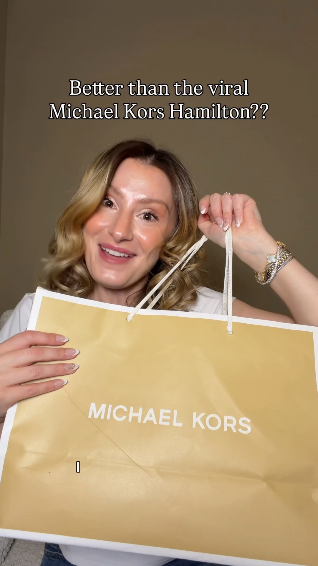 Why is this not the most viral Michael Kors bag?! 😍 Comment SHOP & I’ll dm you the link 👜

I went to find the large Michael Kors Hamilton satchel that has gone super viral but it is completely sold out in the color luggage everywhere!

I came across the new large Bryant bag and immediately thought it’s just as good (maybe even better) that the Hamilton satchel 😍
They did a cool spin on the Coach turnlock trend with the MK logo which is so cool and creative! You can also completely cover it if you want a logo less bag.

The strap is also incredibly versatile! You can wear it with just the leather strap or just the chain strap. With both to decorate or connect them to make a crossbody bag. The chain unhooks in the middle so that possibilities on how you can style it are endless!

This should be the viral Michael kors bag imo!