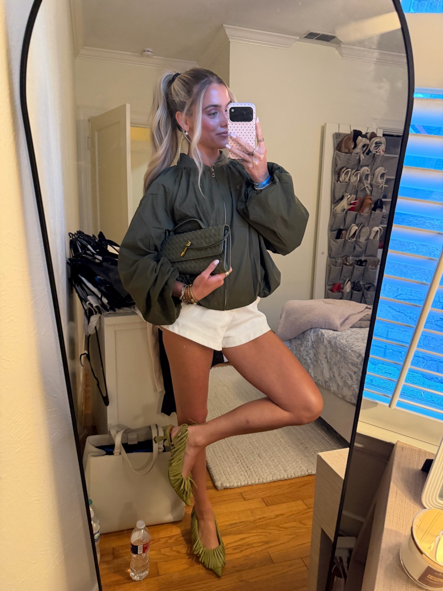 Dallas outfit for a night out! My shirt is size small from amazon Womens Puff Bomber Jacket Casual Batwing Sleeve Stand Collar Zip Up Pleated Jacket Windbreaker Outwear. My shorts are from @Revolve size XXS. The fringe green shoes are my new favorite @Dillards Inc.

#LTKootd #LTKdayinmylife #LTKCon