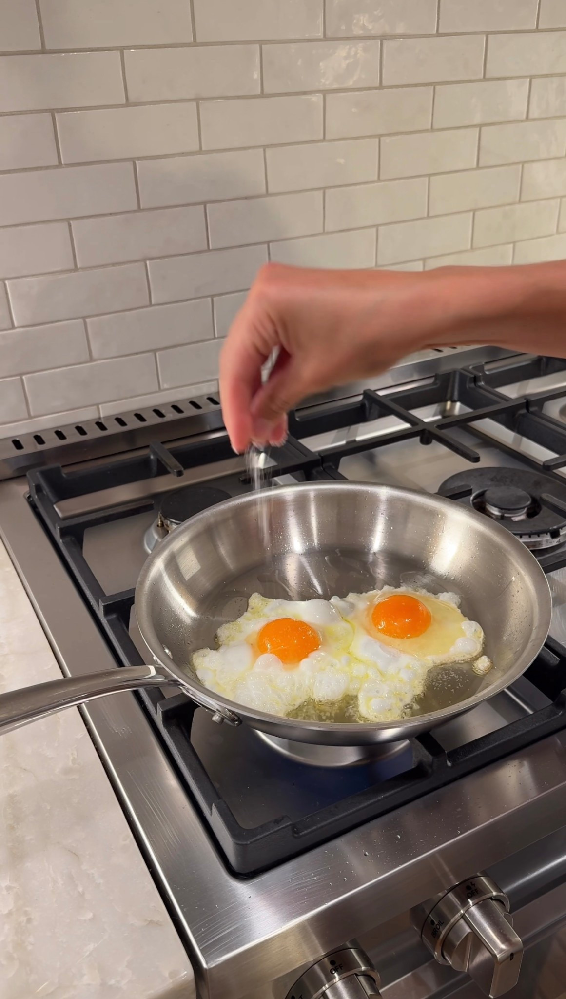 this All-Clad D3 Curated Cookware Set from @crateandbarrel is bonded & assembled in the USA and made of stainless steel and aluminum + oven safe to 600 degrees F.  #cratepartner #allclad #builttolast #ad 

#LTKGiftGuide #LTKSeasonal #LTKHome