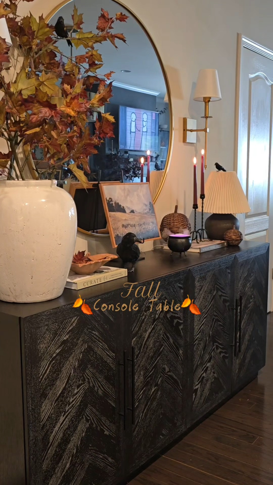 Restyled my Fall Console in honor of the first day of Fall! I just added a few crows and this $5 mini cauldron from 5 below. linked an alternative.  

 #LTKSeasonal #LTKHome