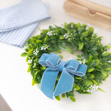 Love the way these blue velvet ribbon bows compliment our mini boxwood wreaths 💙 they were perfect for our coastal-inspired Christmas kitchen decor this year! 

#LTKHoliday #LTKhome #LTKSeasonal