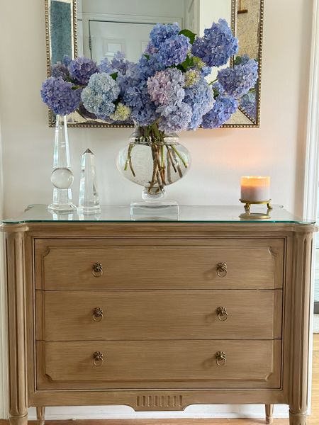 Entryway table styling with these gorgeous hydrangeas. 🩵💜






Front gate chest of drawers, obelisk house of Blum Alice Lane Home candle, hurricane base clawfoot dish

#LTKFindsUnder50 #LTKFindsUnder100 #LTKHome
