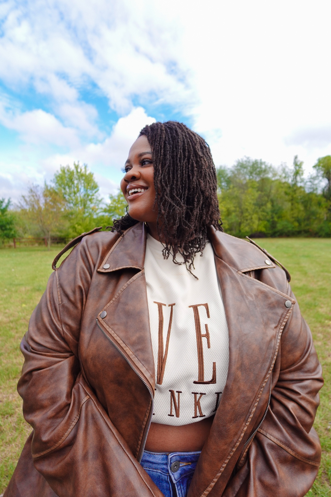 This look combines comfort and confidence! I’m wearing.m a size 26 in the tee, and recommend sizing down. I’m wearing a 26 in the jacket as well and have linked to an alternative from the same brand. And I’m wearing a 26 in the jeans. Featuring an oversized graphic tee that makes a statement, paired with a brown aviator jacket that adds instant edge. This cozy yet stylish outfit is perfect for casual fall days. Wear the tee tucked for a trendy cropped effect!

#LTKPlusSize #LTKFindsUnder50