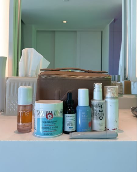 Morning skincare lineup & my leather traincase for toiletries 

I have the medium size case in camel with trapunto initials