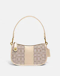 swinger in signature jacquard | Coach (UK)