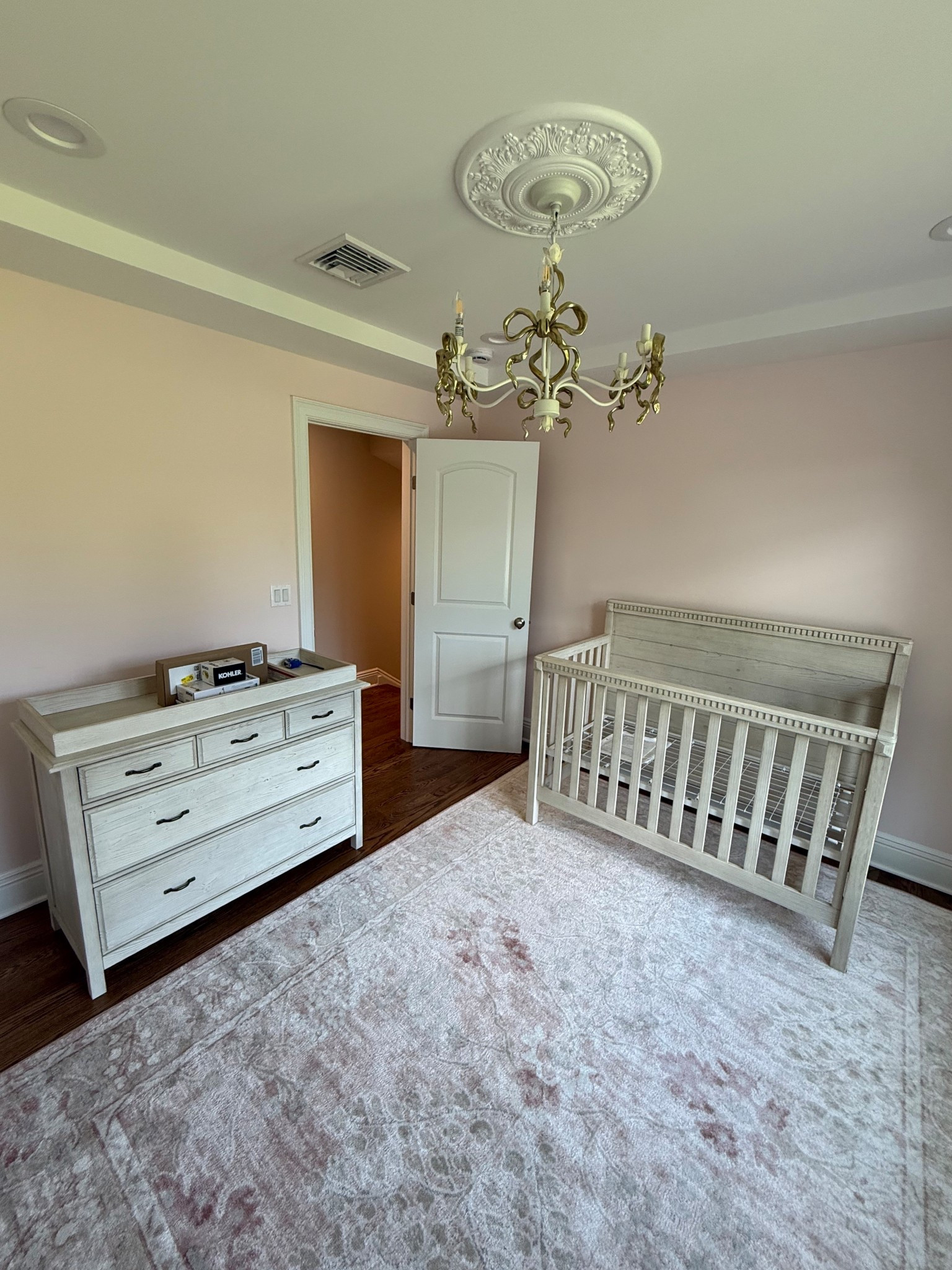 Baby nursery // loveshackfancy chandelier // pottery barn kids Rory dresser and crib // wayfair rug 

#LTKBaby #LTKKids #LTKHome