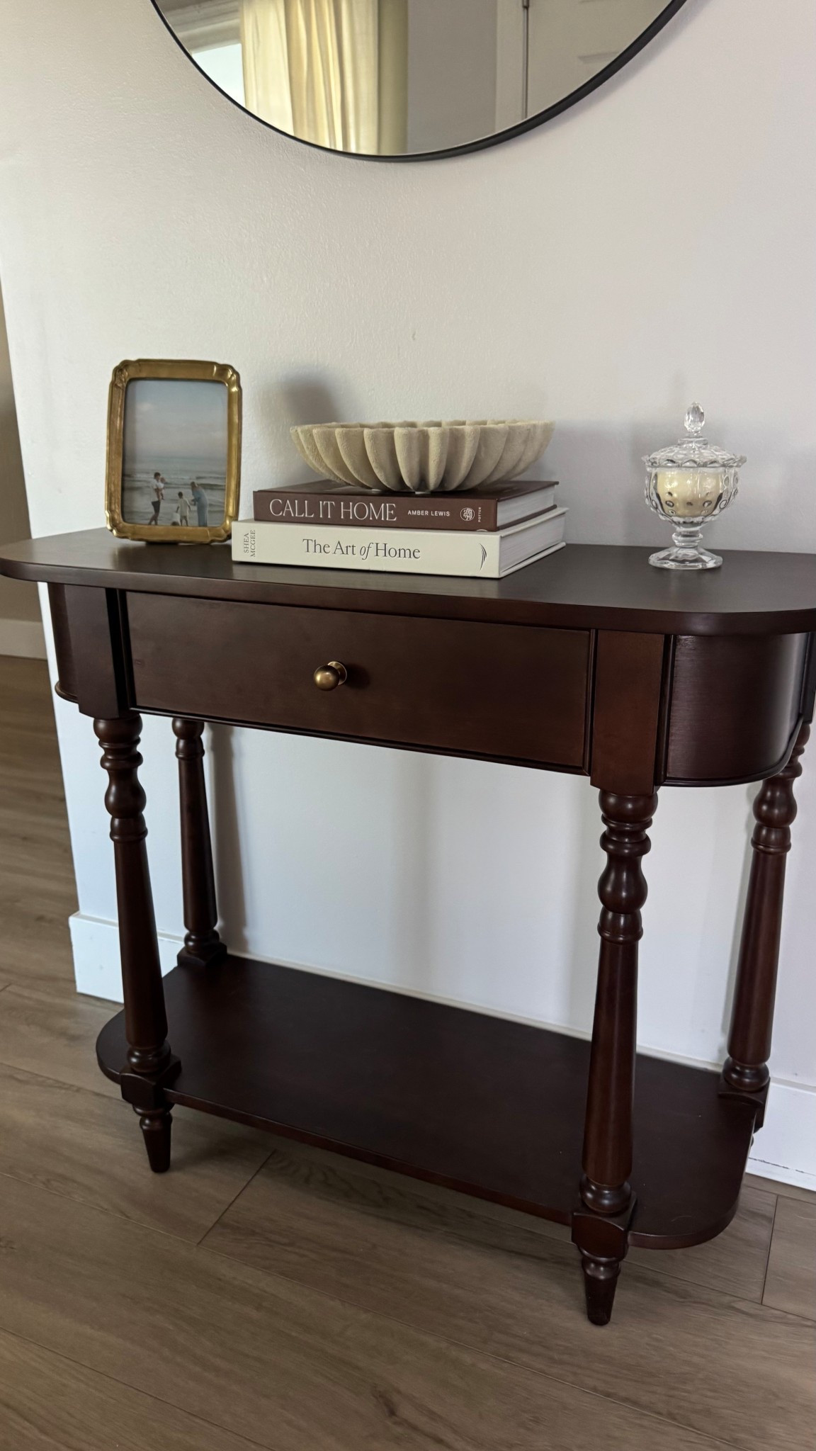 We are loving our new entry table! We got a brass knob to replace the one it came with and it completely elevated it. We are so impressed by its quality 

#LTKHome