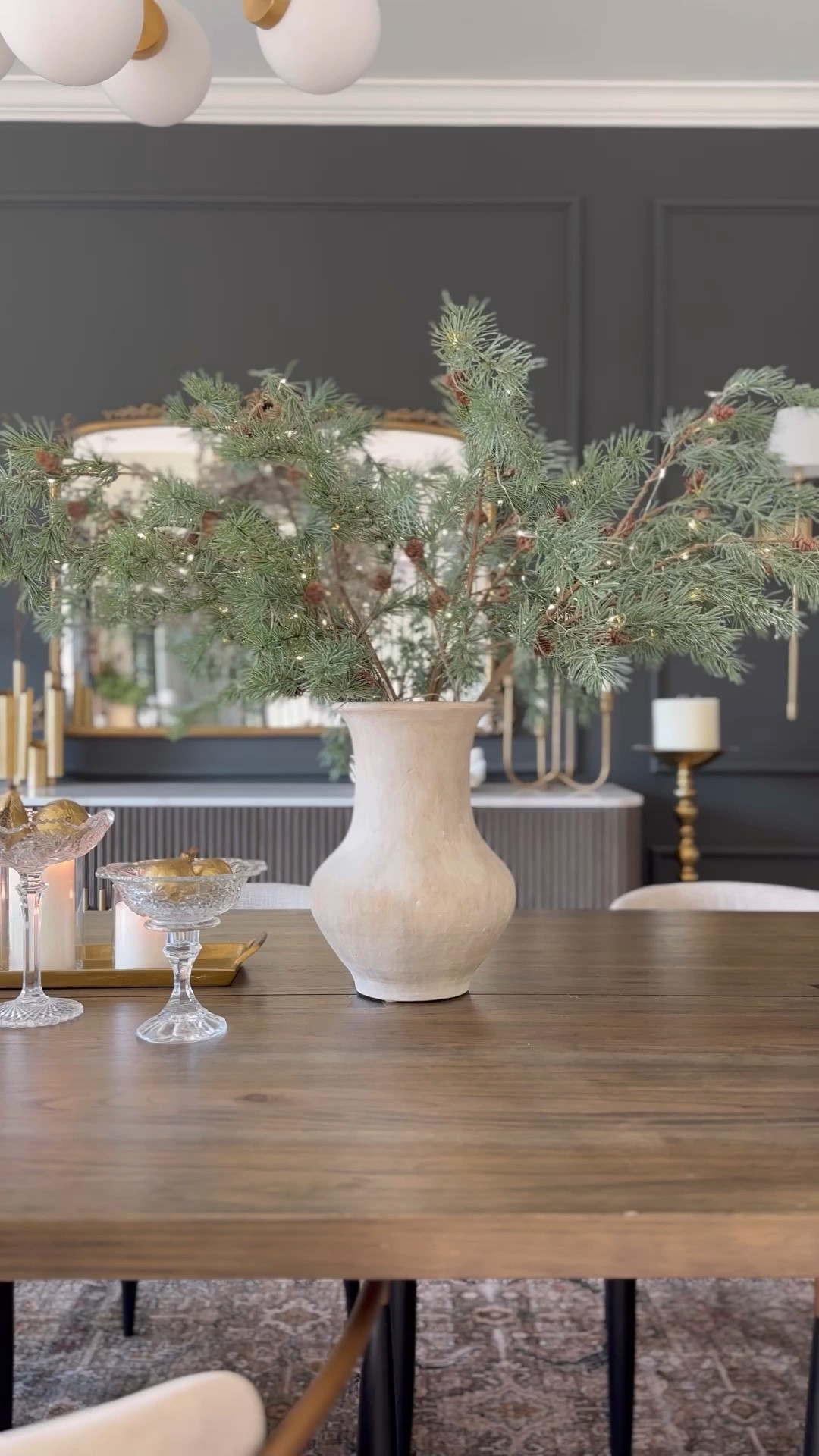 Holiday dining table centerpiece! I used 3 bundles of these lit pine branches and these pretty good figs in vintage crystal 🥰

#LTKHome #LTKHoliday #LTKFindsUnder50