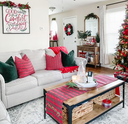 Traditional red and green Christmas decorated living room 

#velvetgreenpillow #tartanplaidpillow #christmaswallsign #christmas #holidaydecor 

#LTKhome #LTKSeasonal #LTKHoliday