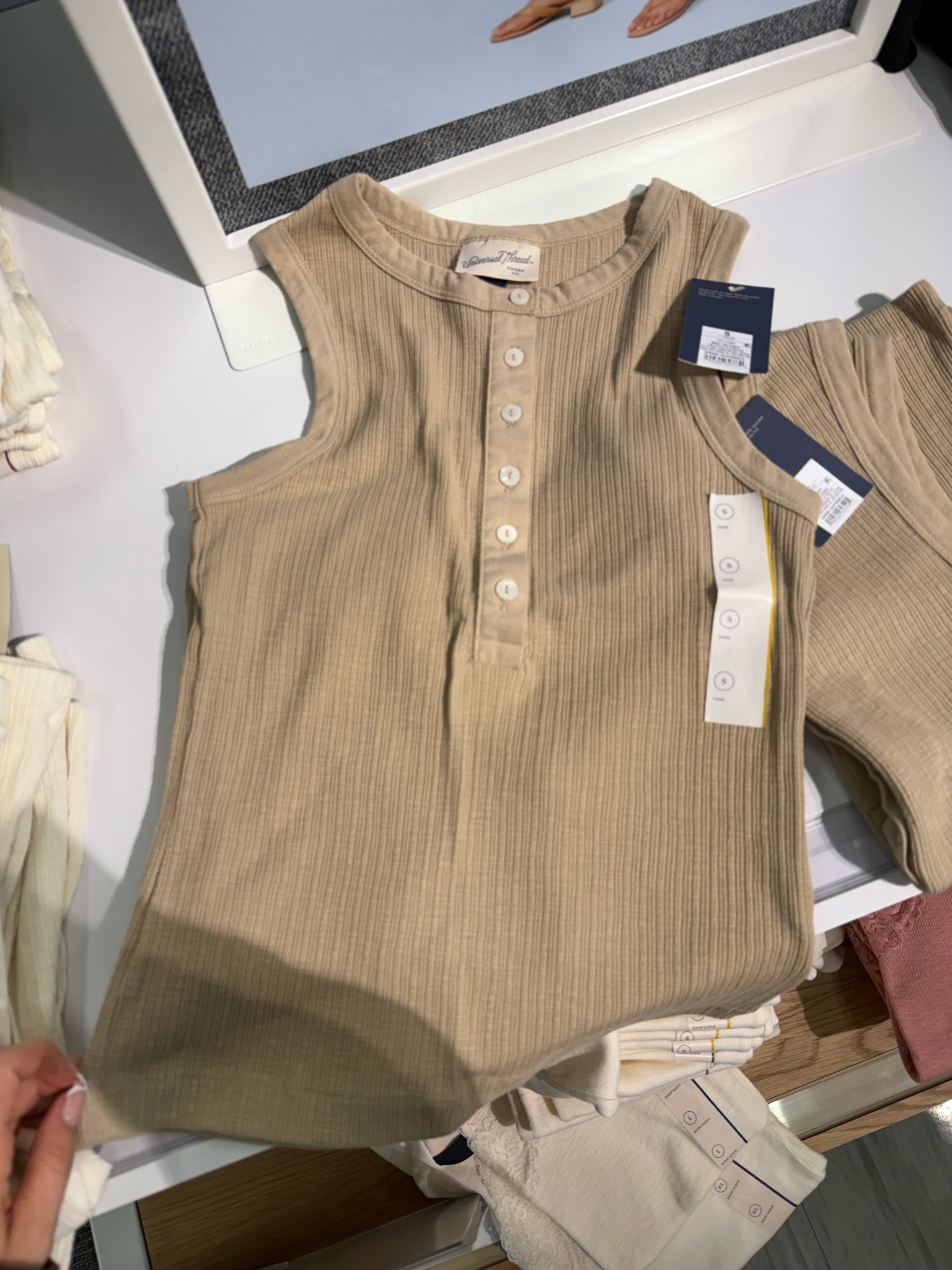 Neutral tank with cute little button details 🤍

#LTKgrwm #LTKootd #LTKSeasonal