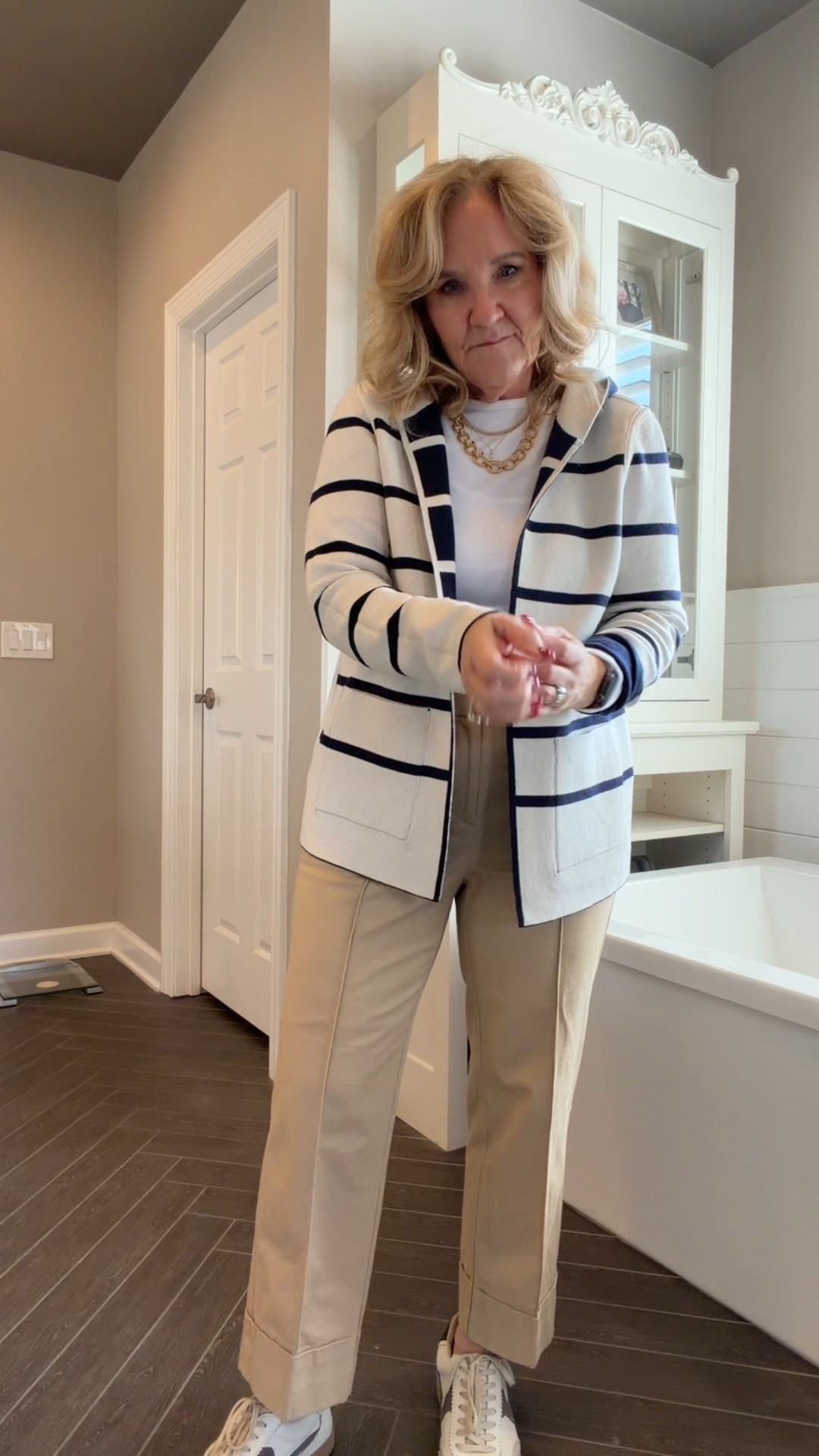 It’s reversible. Isn’t this a cute sweater? Wearing size 1.0
Khakis size 8 petitewhirw tee size medium 

#LTKOver40 #LTKWorkwear #LTKTravel