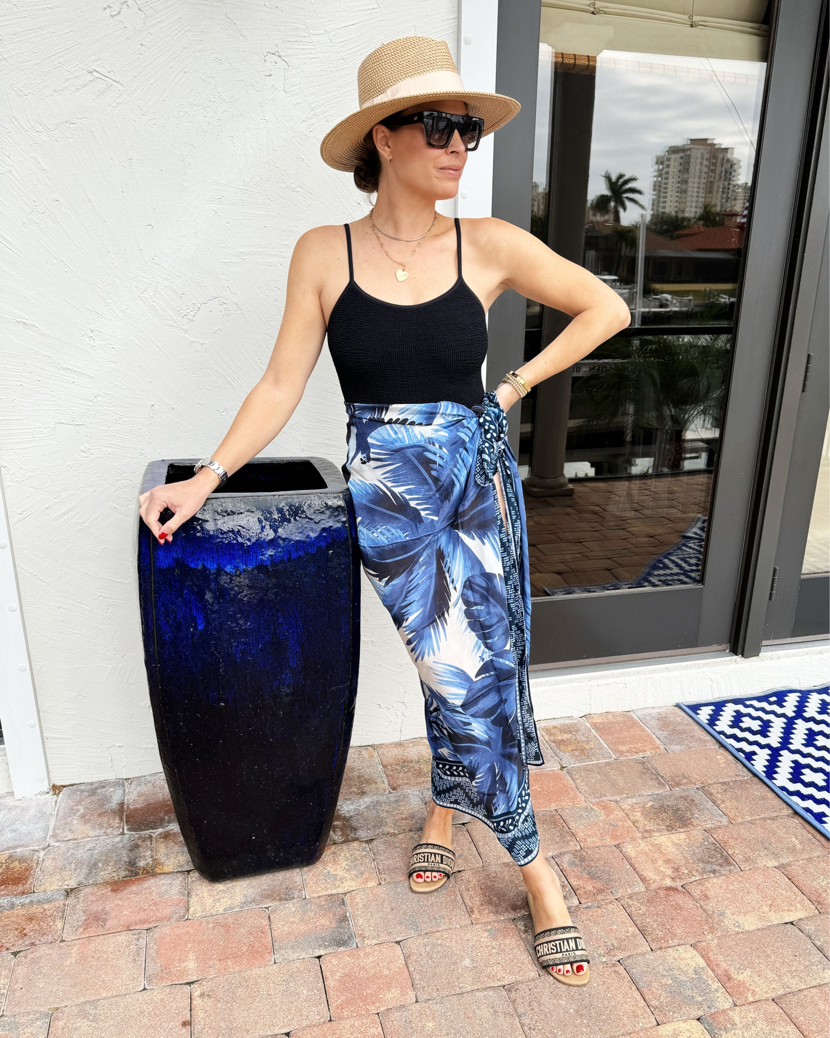 Vacation outfit! Wore my favorite one piece suit with this stunning sarong for a pool day on vacation. 

#LTKswim #LTKover40 #LTKSeasonal