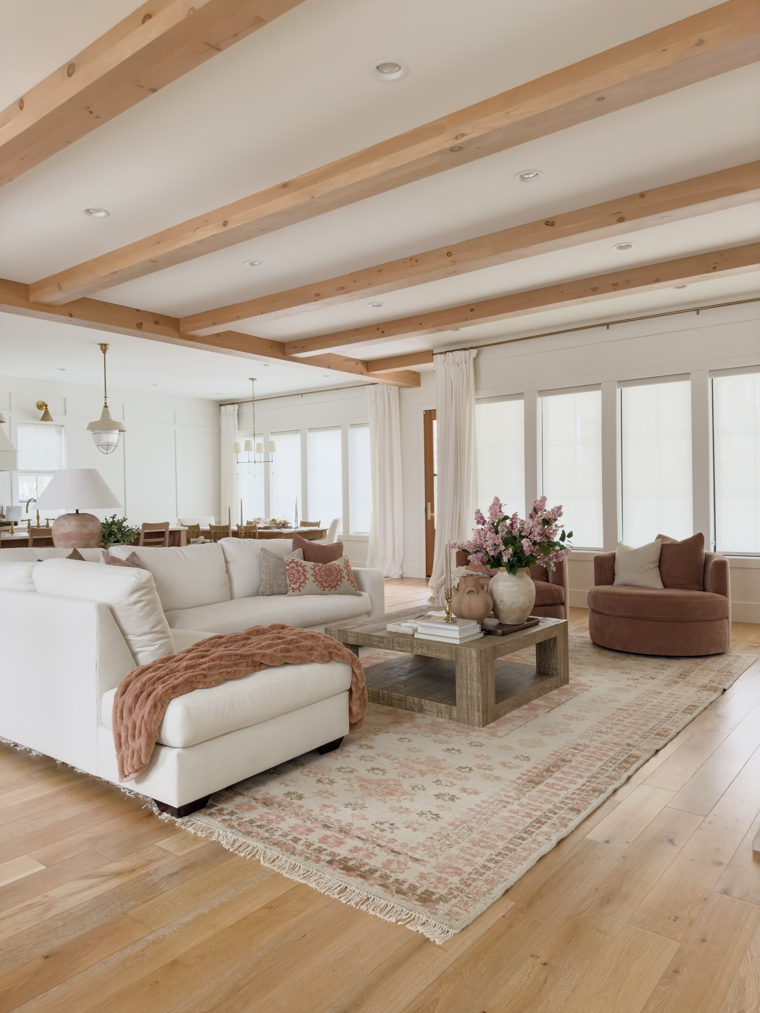 Spring living room reveal featuring a statement white sectional and stunning rosewood accent chairs to compliment this neutral area rug with pops of pink

Spring living room, living room refresh, sectional faves, accent chair, neutral area rug, spring throw pillow, faux stems, Pottery Barn style, coffee table faves, creamy whites, natural wood tones, pops of pink, open concept living, spring refresh, coffee table decor, light and bright, shop the look!

#LTKSeasonal #LTKhome #LTKstyletip