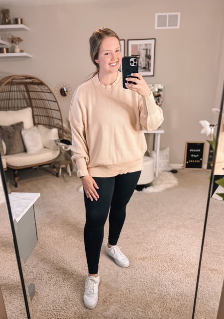 Apricot color big name similar looking sweater. Ordered it in a bunch of colors and this one was one of my faves! Runs TTS, wearing large and normally wear L/XL. Perfect to pair with leggings and clean white tennis shoes. Love how they look with my white tennies!

#LTKunder50 #LTKSeasonal #LTKstyletip