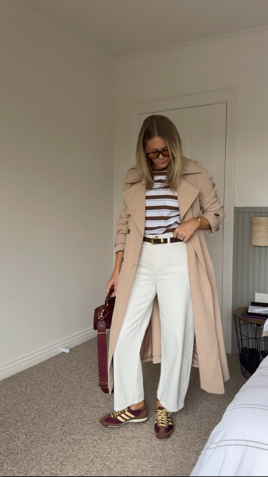Trench weather is here! I’m in a 16 in the trench for an oversized fit, medium in the tee and 10 in the jeans (jeans and belt are Feather & Noise but I’ve linked similar!).

#LTKgrwm #LTKSeasonal #LTKootd