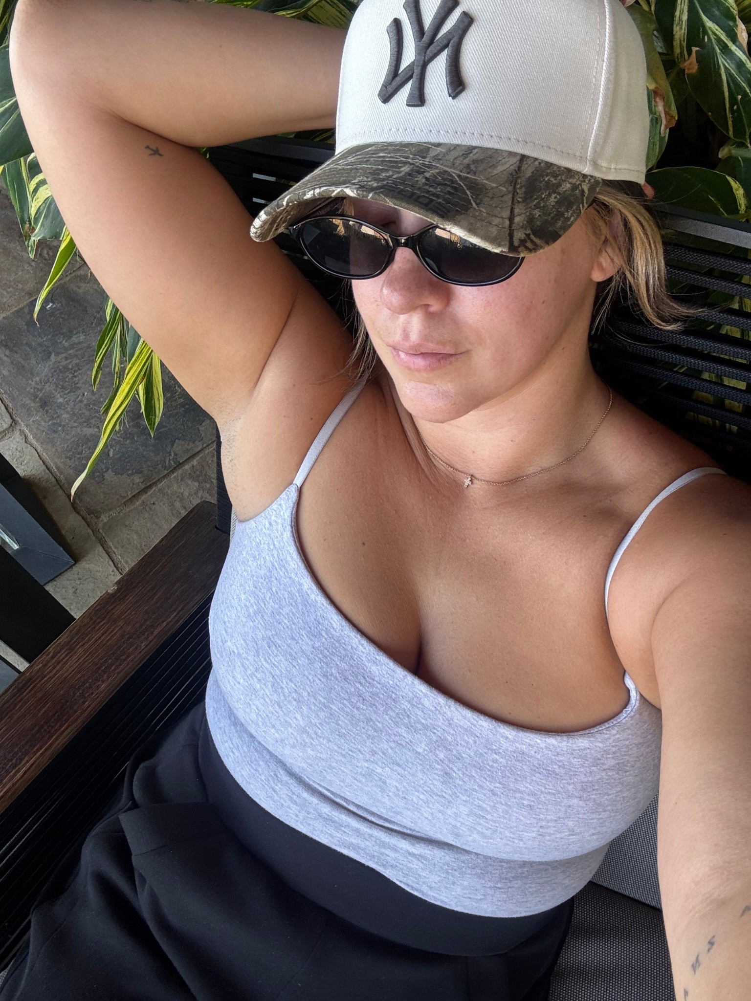 Traveling home with a heavy heart today. Hat is exclusive and so fun. Tank size M, pants size L. Code NINAXSPANX for 15% off pants. 

#LTKTravel #LTKSeasonal #LTKFallSale