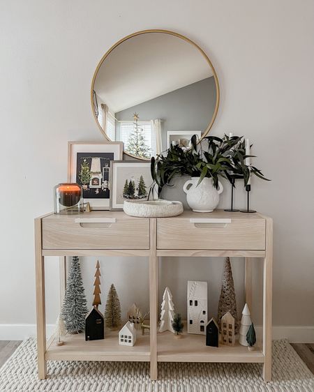Neutral Christmas/holiday entryway 🌲



Winter artwork, neutral artwork, Skeem candle, gold round mirror, circle mirror, gold mirror, eucalyptus, white vase, wooden console table, wood table, candlesticks, winter village, Christmas village, faux trees 

#LTKGiftGuide #LTKhome #LTKHoliday