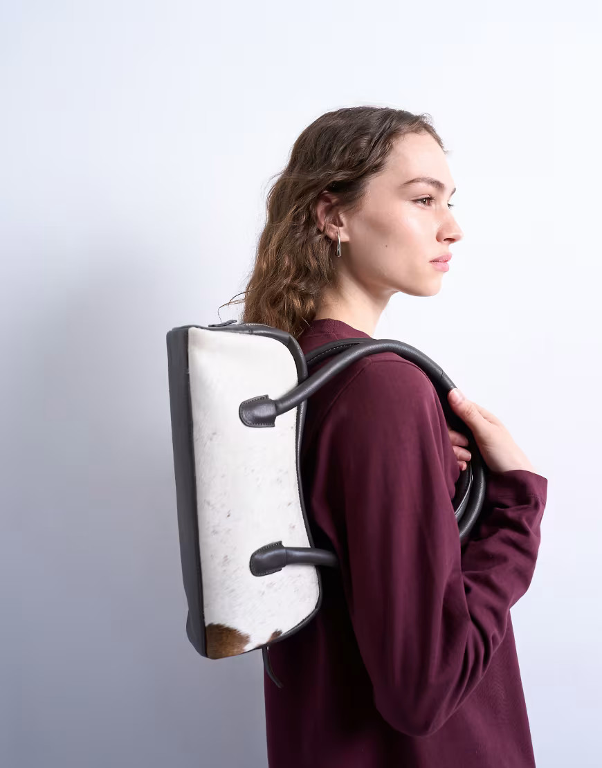 Topshop Sullivan real leather shoulder bowler bag in cow print pony-Multi | ASOS (Global)