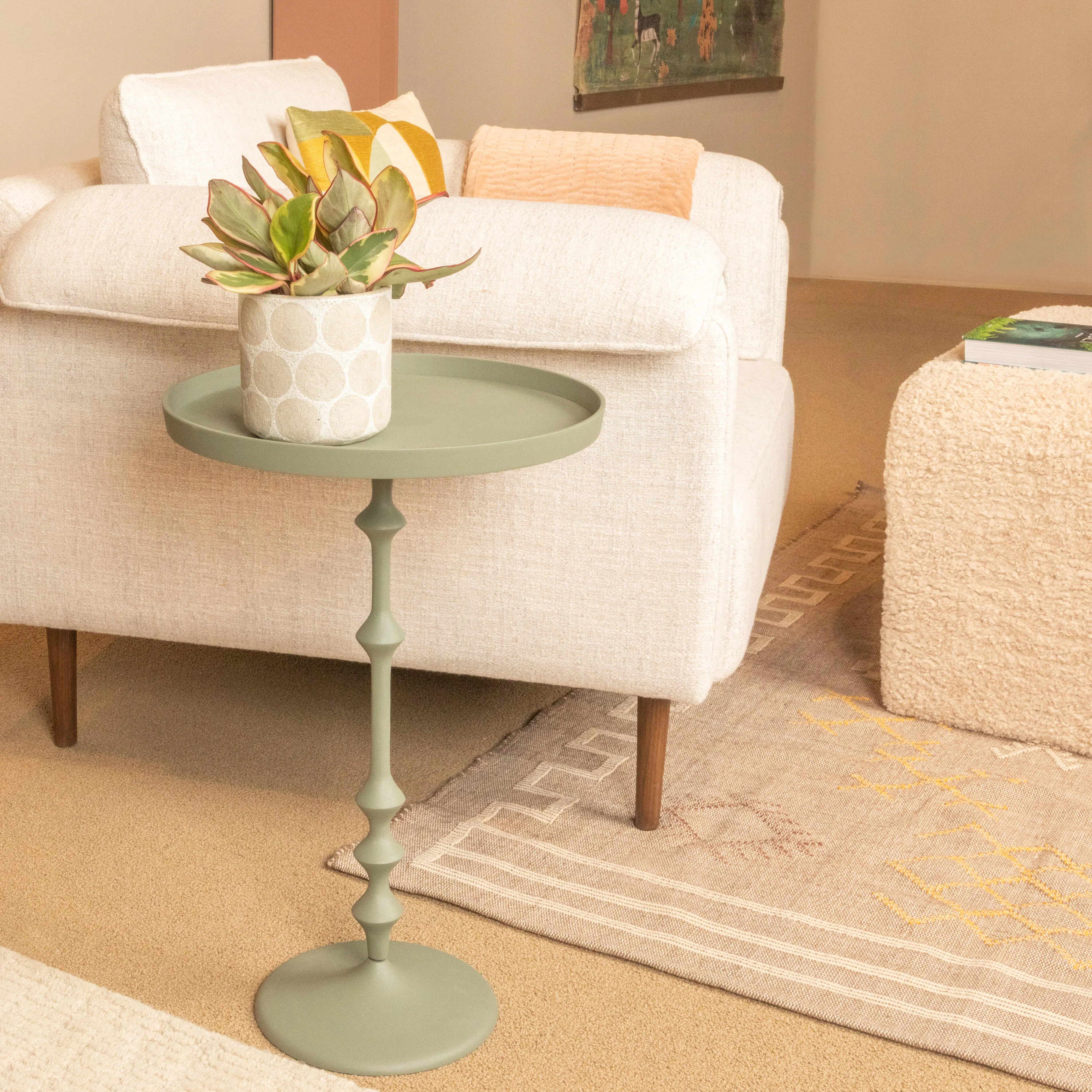 Storied Home Sculptural Silhouett Accent Table | Ashley | Ashley