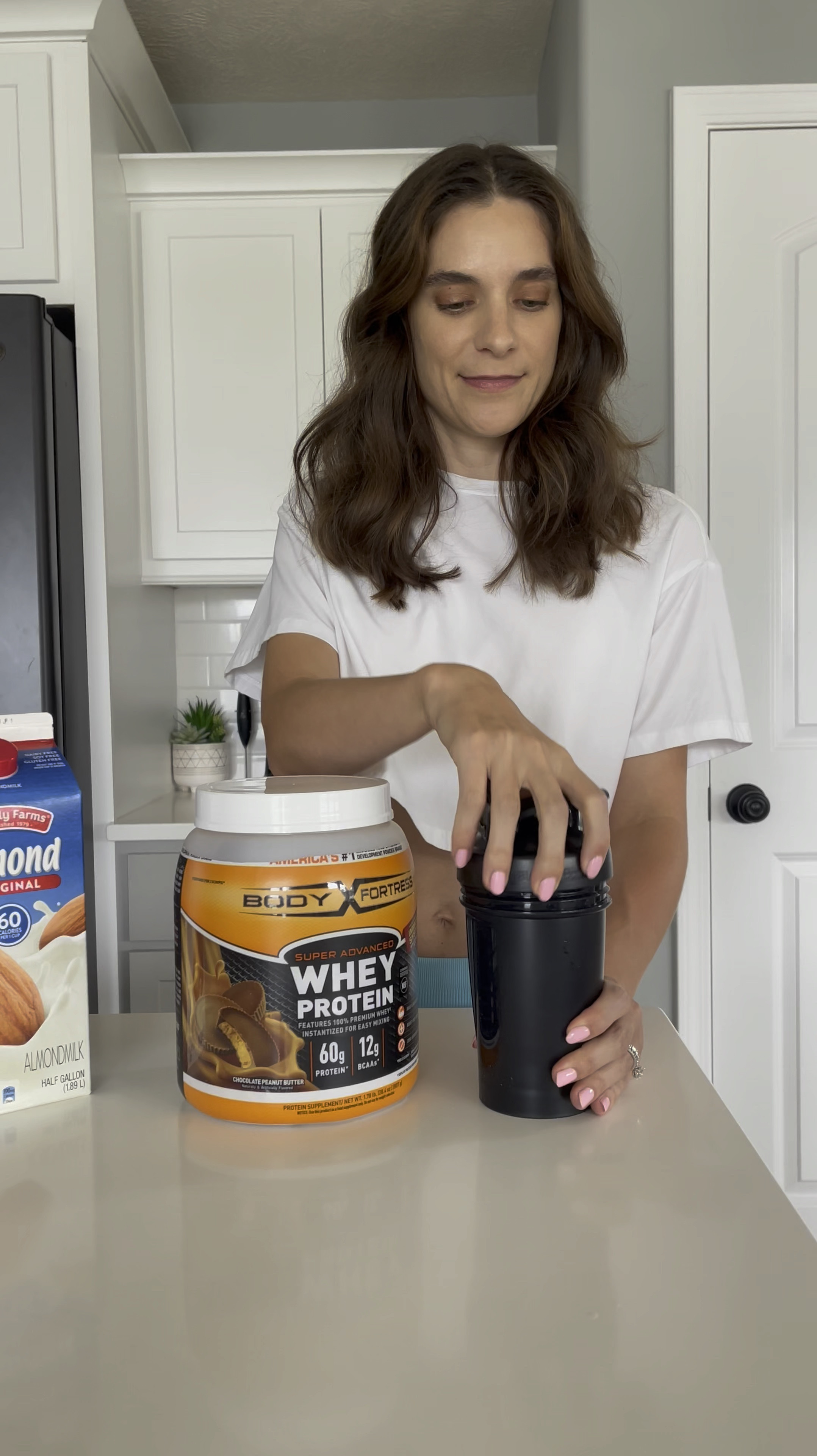 Making a protein shake with almond milk in this blend bottle. Everything can be found on Amazon. 

#LTKFindsUnder50 #LTKFitness