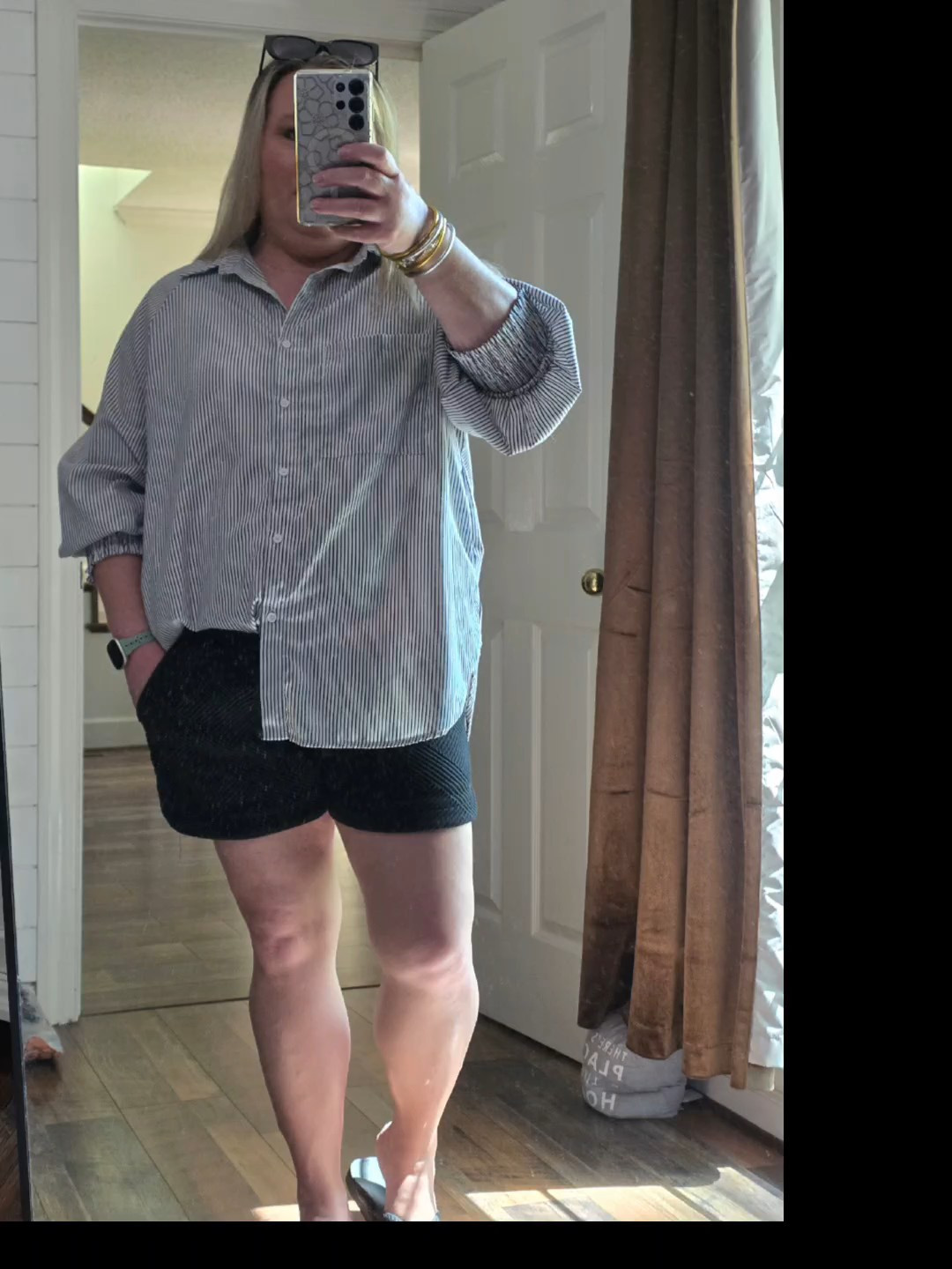 Loving this top paired with these black shorts. Perfect for spring and summer days. The shorts are by umgee and not available too is linked. 

#LTKOver40 #LTKmomlife #LTKWorkwear