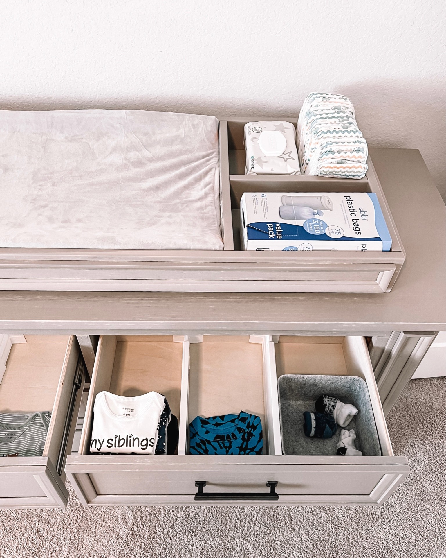 Drawer organizers! These have been great for all of his sized different onesies, different seasonal onesies, and all accessories!

#baby #nursery #organization #nurseryorganizing #drawerorganization

#LTKkids #LTKhome #LTKbaby