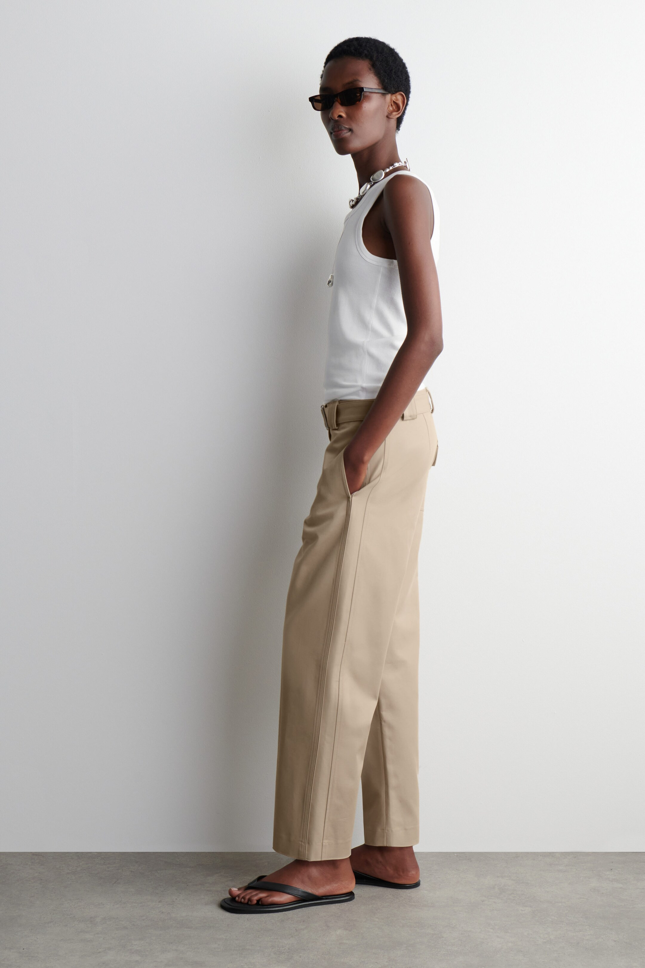 BELTED SLIM-LEG TROUSERS - LIGHT BEIGE | COS UK