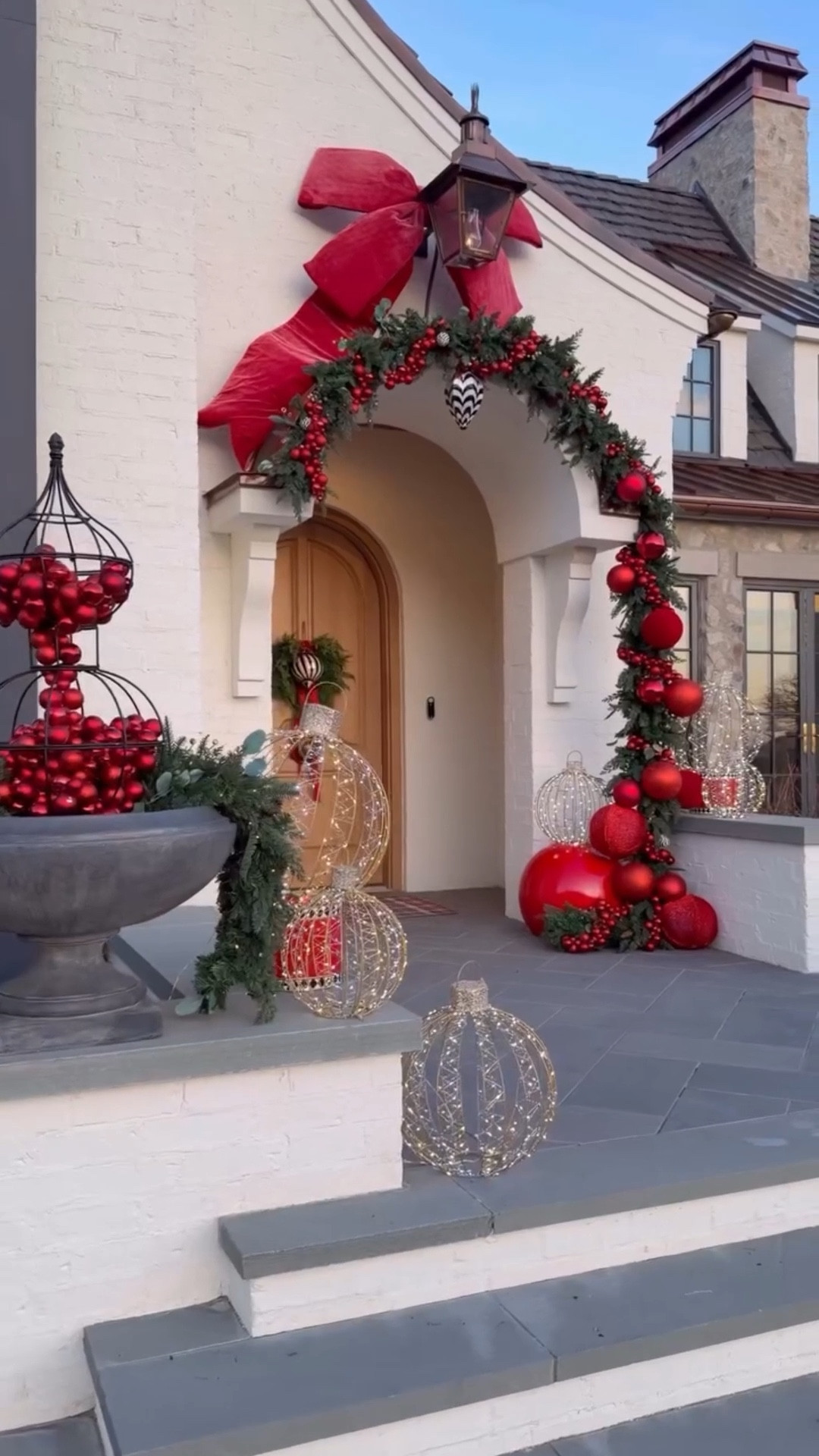 Classic Cherry Christmas Porch‼️ Possibly my favorite yet!
Did you spot the painted planter? Truly grounded the holiday install!

Comment PORCH and I’ll dm you all my holiday porch finds! Many I use year after year!