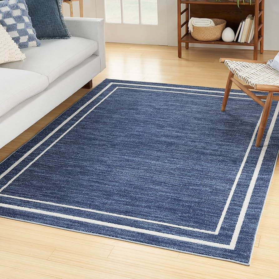Nourison Essentials Indoor/Outdoor Solid Bordered Navy/Ivory 5' x 7' Area Rug, Easy Cleaning, Non... | Amazon (US)