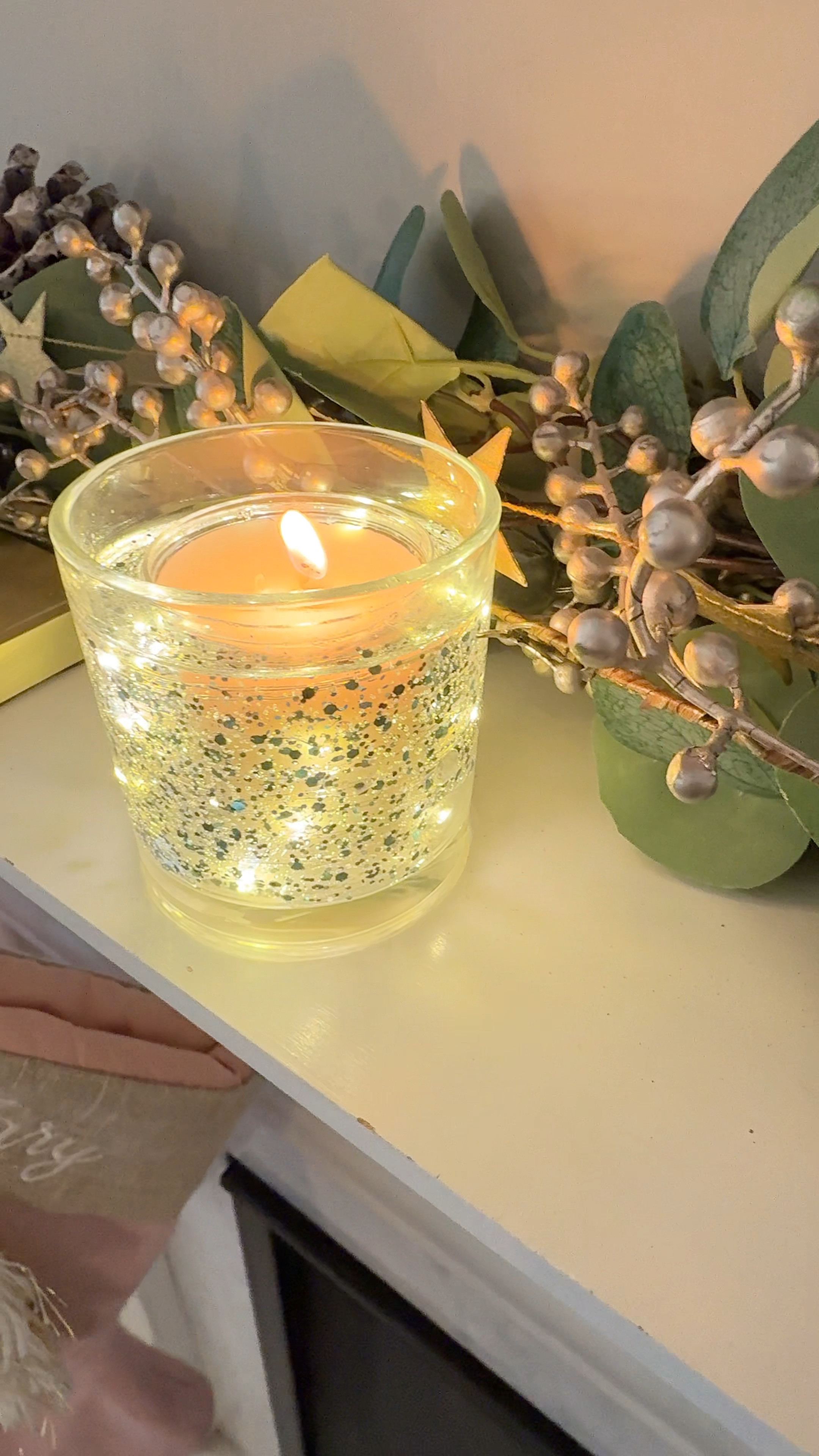 Magic candle from Target! This pretty candle has LED lights around it and when you light the candle they come on and they go off when you blow it out! It’s so fun and pretty and smells amazing!! 

#LTKHome #LTKHoliday #LTKWatchNow