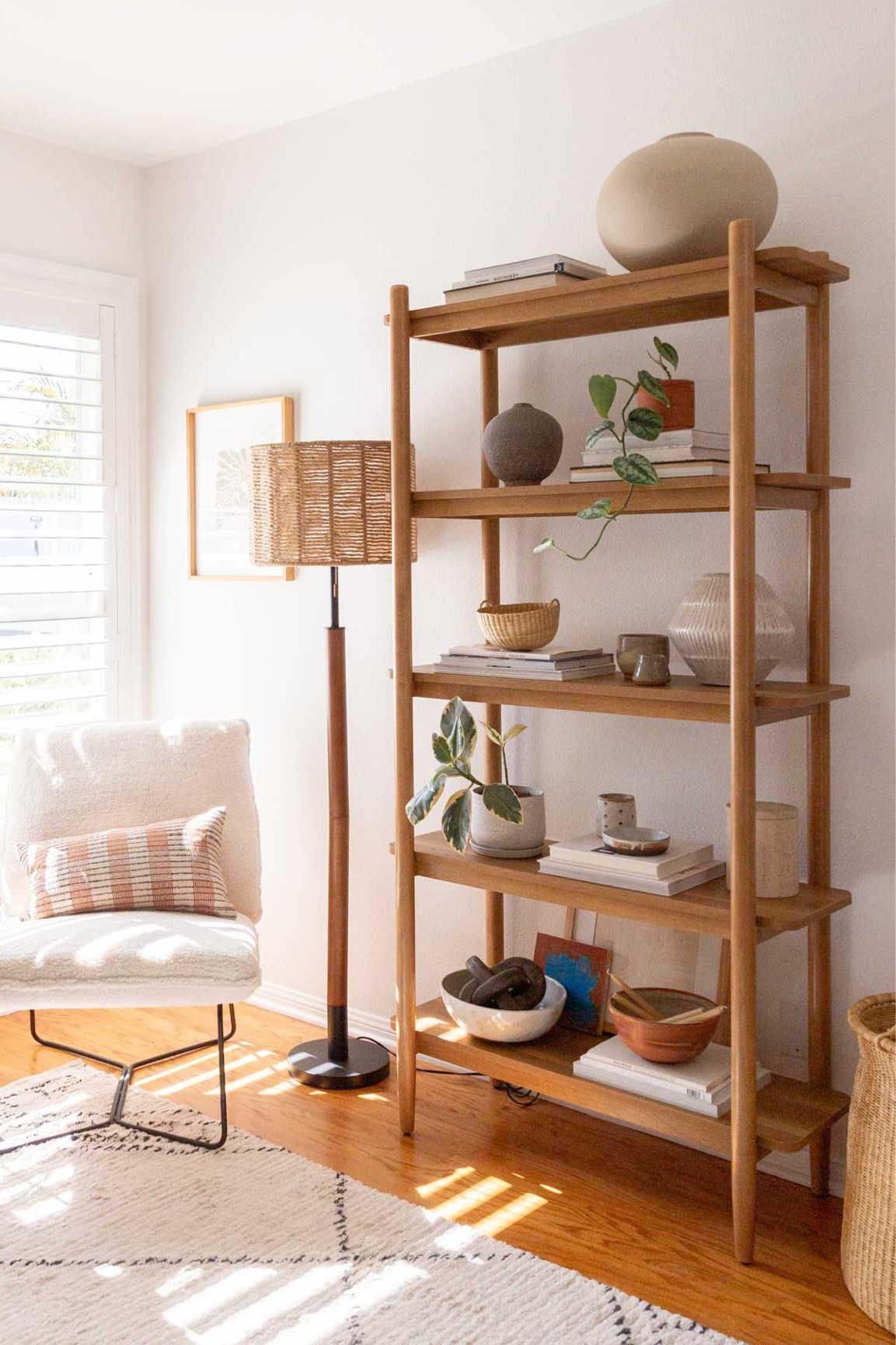 Turned my mom’s home office into a reading nook with just a few pieces. The bookcase is such a good staple piece and the rug is another fave. Really good price. Shelf - shelving - chair - reading nook - seating area - jute lamp - wood shelves - organic modern - boho style

#LTKhome #LTKFind #LTKstyletip