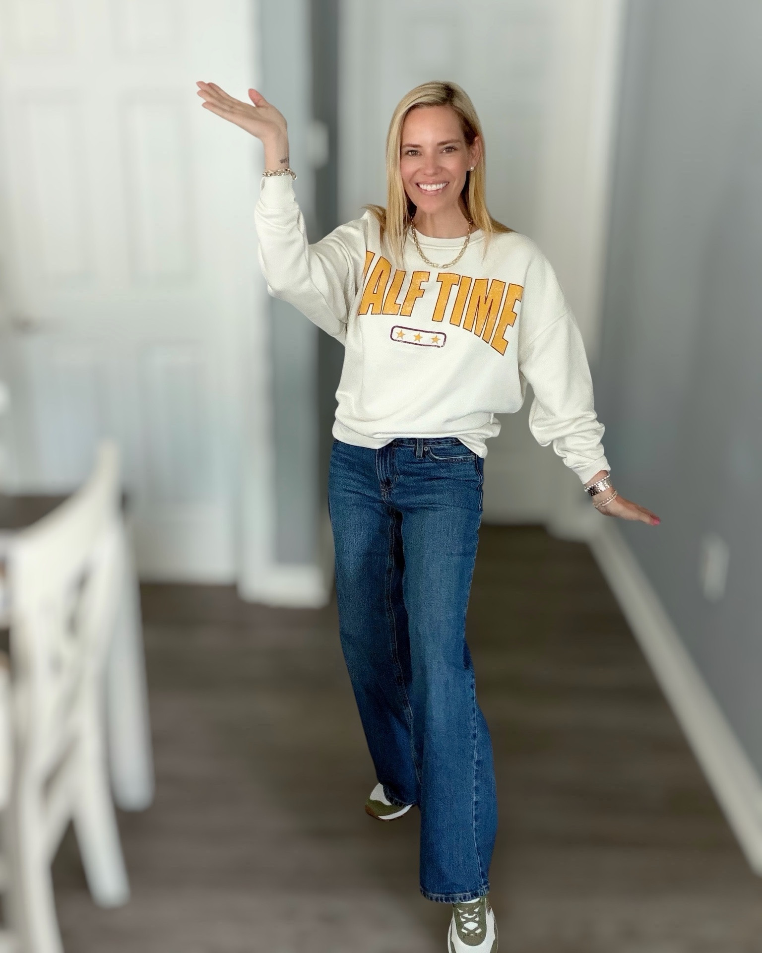 Game Day Halftime Sweatshirt 🏈🤍

Calling all football fans! 🏈 This adorable HALFTIME graphic sweatshirt is the perfect throw-on for tailgates, Friday night lights, college football Saturdays, or cheering from the couch. I paired it with wide-leg denim and classic New Balance sneakers for an effortless game day look that’s cute, comfortable, and easy to wear all season long.

I’ve linked my sweatshirt, jeans, sneakers, and accessories so you can recreate this cozy fall outfit! ❤️💛🏈

Game day outfit, football sweatshirt, halftime sweatshirt, tailgate style, casual fall outfit, women’s graphic sweatshirt, college football fashion, NFL game day look, comfy weekend outfit, wide-leg jeans, New Balance sneakers, fall wardrobe essentials, sporty chic style.

#LTKOver40 #LTKSeasonal #LTKootd