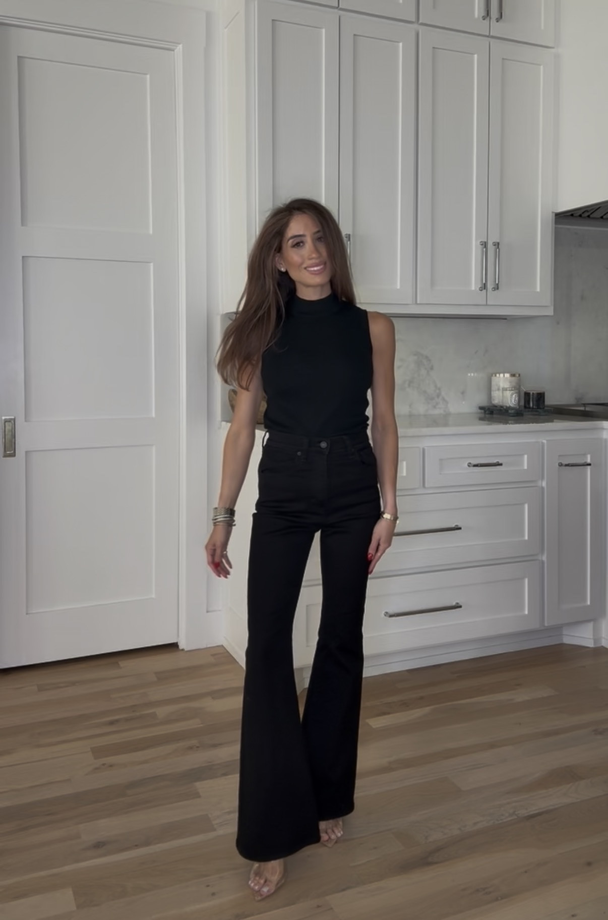 Black flare jeans petite friendly size 23 or 24s sleeveless Amazon sweater. Spring outfit date night 

#LTKSaleAlert #LTKPetite #LTKootd