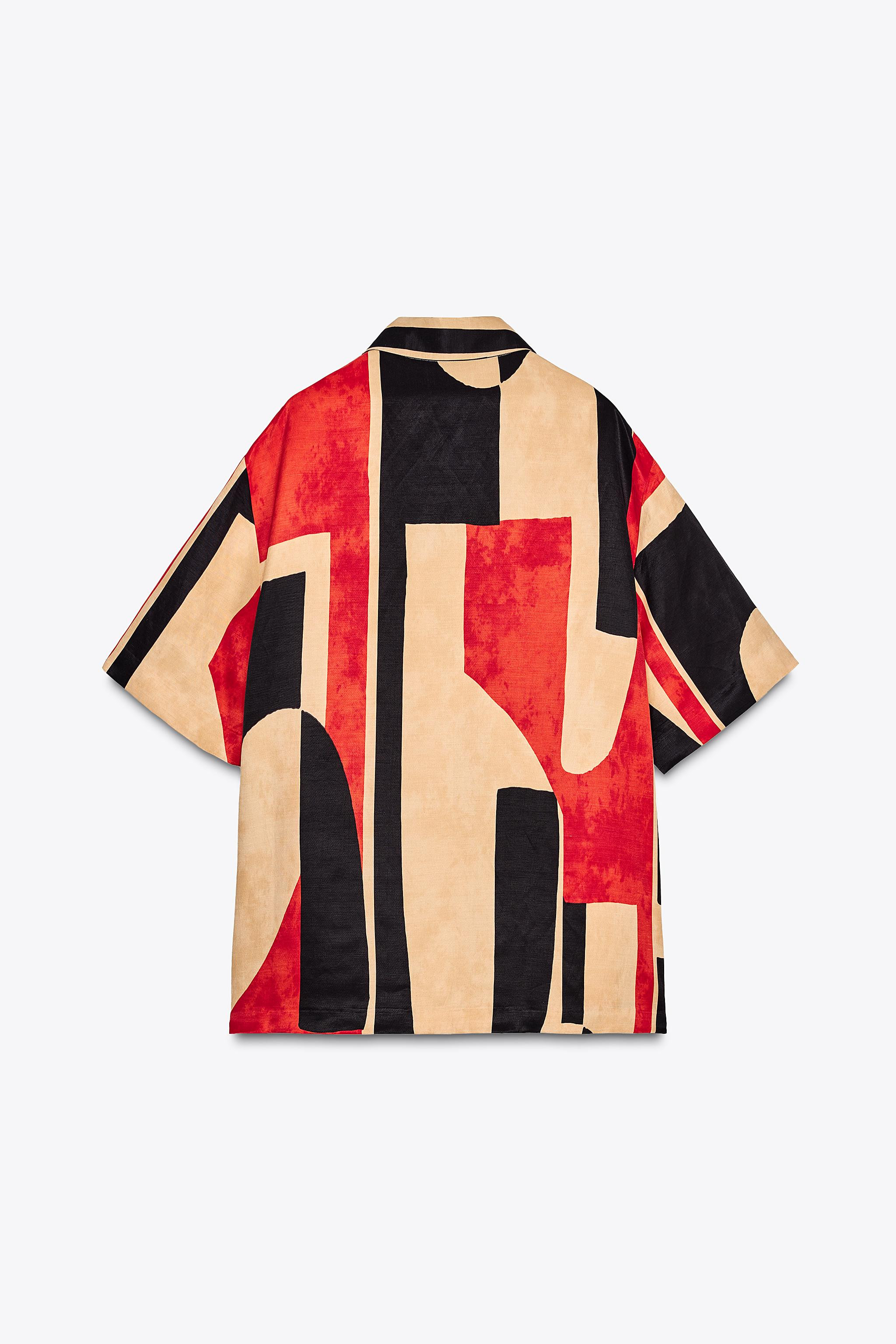 ZARA WOMAN COLLECTIONShirt made of a viscose blend yarn with 21% linen. Lapel collar and short sl... | Zara US