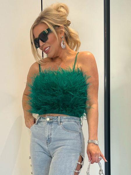 Date or GNO Spring Outfit or for St. Patrick’s Day!
Green Ostrich Feather Cami Crop Top (can be worn strapless) Wearing a M
BUT THESE JEANS! Covered in Diamonds Side Split High Rise Wide Leg Raw Hem Denim Jeans - They also come in white! Wearing a 3
Green sunglasses are fun dupes!

#LTKover40 #LTKfindsunder100 #LTKstyletip