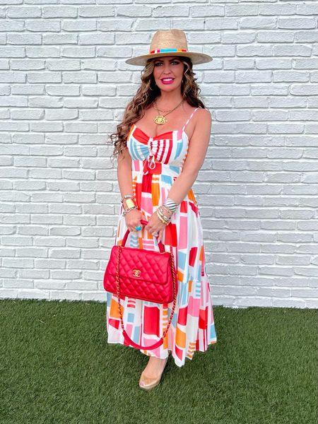 This dress from Julia Jordan just screams vacation! I accessorized with a fun straw hat and red handbag  

#LTKParties #LTKOver40 #LTKStyleTip