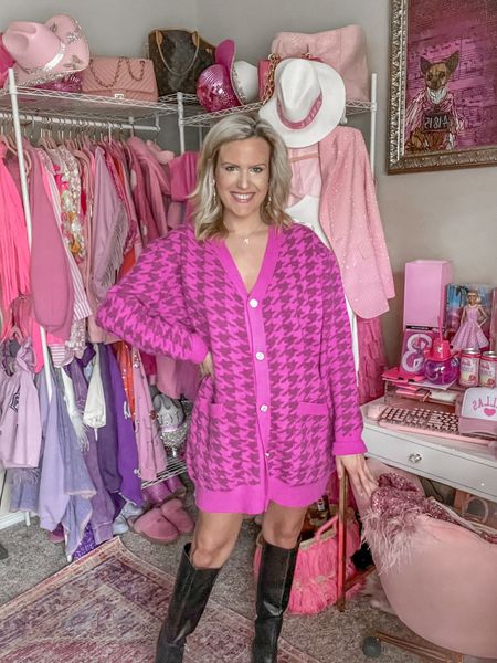 Pink cardigan
Cardigan dress
Winter outfit
Black knee high boots
Large heart rhinestone earrings
Oversized sweater
Workwear cardigan 

#LTKworkwear #LTKsalealert #LTKSeasonal