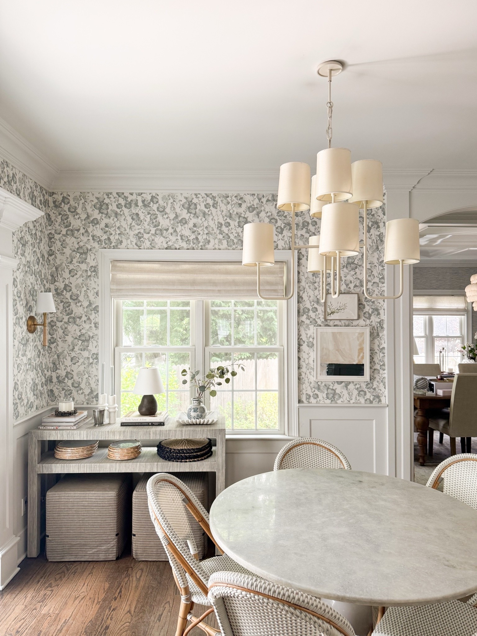 The breakfast nook is one of my favorite examples of layered lighting. The chandelier defines the space without competing with the wallpaper, while the table lamp on the console adds a softer glow that makes this corner feel just as inviting at night as it does during the day. 

Breakfast nook lighting, dining chandelier, layered lighting, modern chandelier, neutral home decor, floral wallpaper, table lamp styling, breakfast nook decor, home lighting ideas, GirlOnTheHudson

#LTKHome #LTKSeasonal