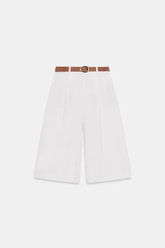 Model height: 173 cmHigh-waisted Bermuda shorts with front pleats and a belt. Front pockets. Side... | Zara Canada