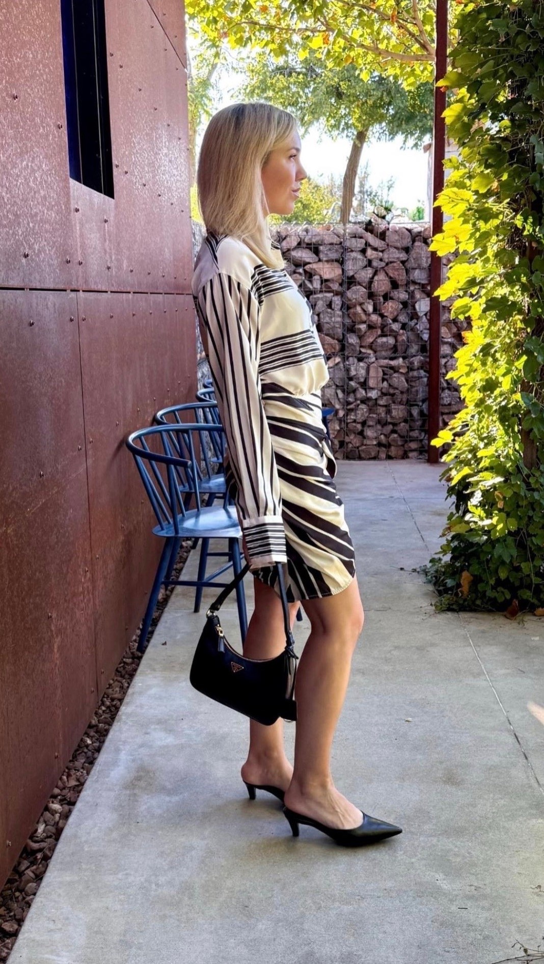 I worn this dress more times than I can count! Sooo good!

Stripe dress
Revolve dress
Prada bag