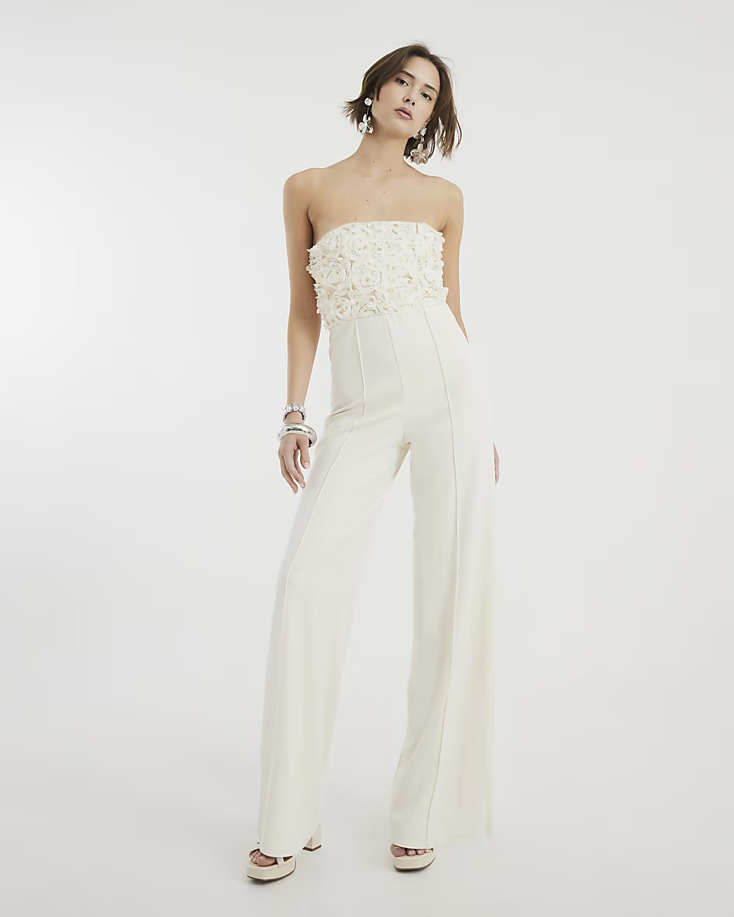 Cream Sleeveless 3D Petals Bandeau Jumpsuit | River Island UK & IE