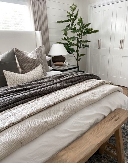 Bedroom, bedding, wood bench, nightstand, table lamps, throw pillows, neutral spring bedroom, faux tree 

#LTKHome #LTKStyleTip