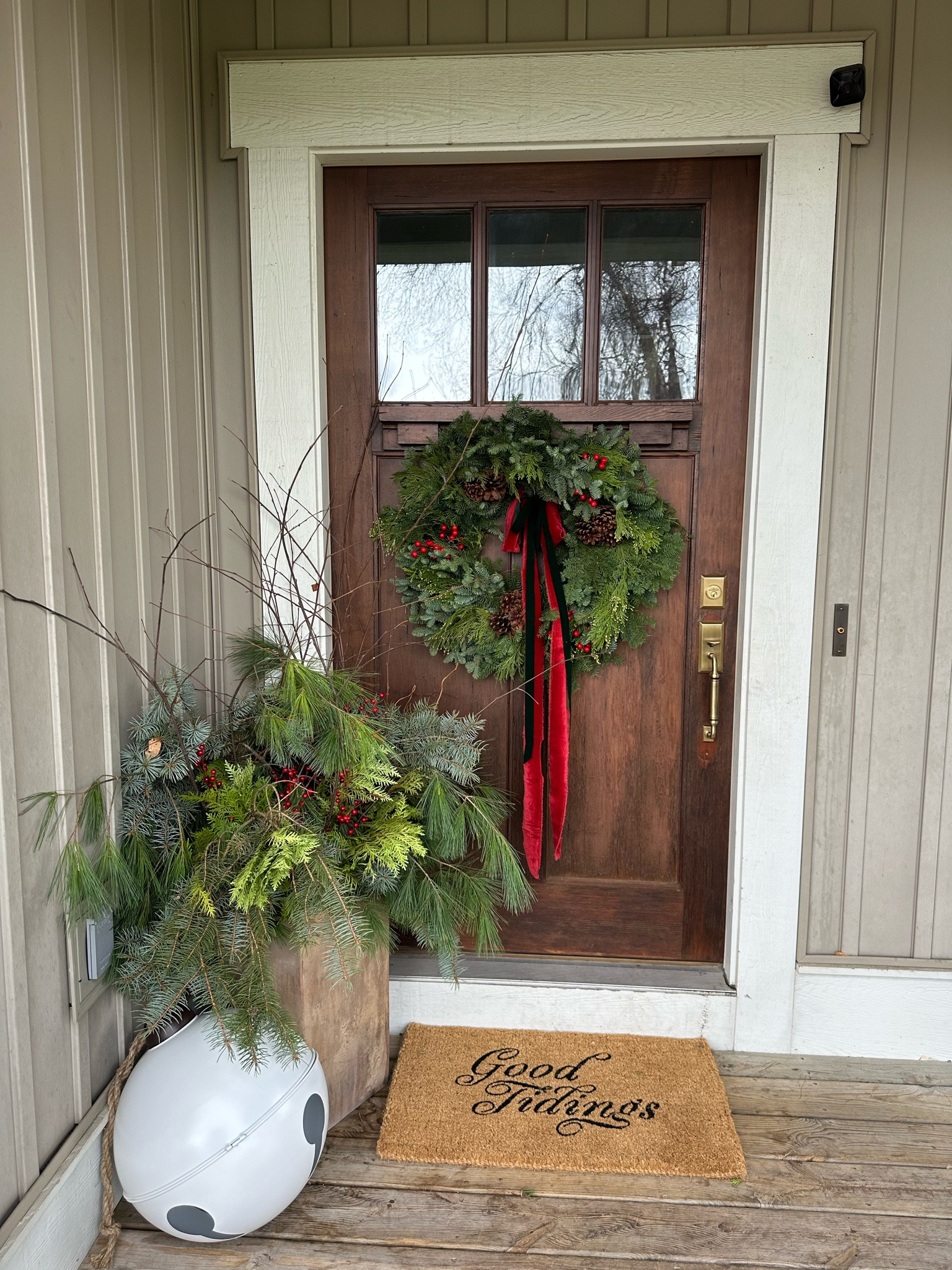 The beginning of our winter porch. 

#LTKSeasonal #LTKHoliday #LTKSaleAlert