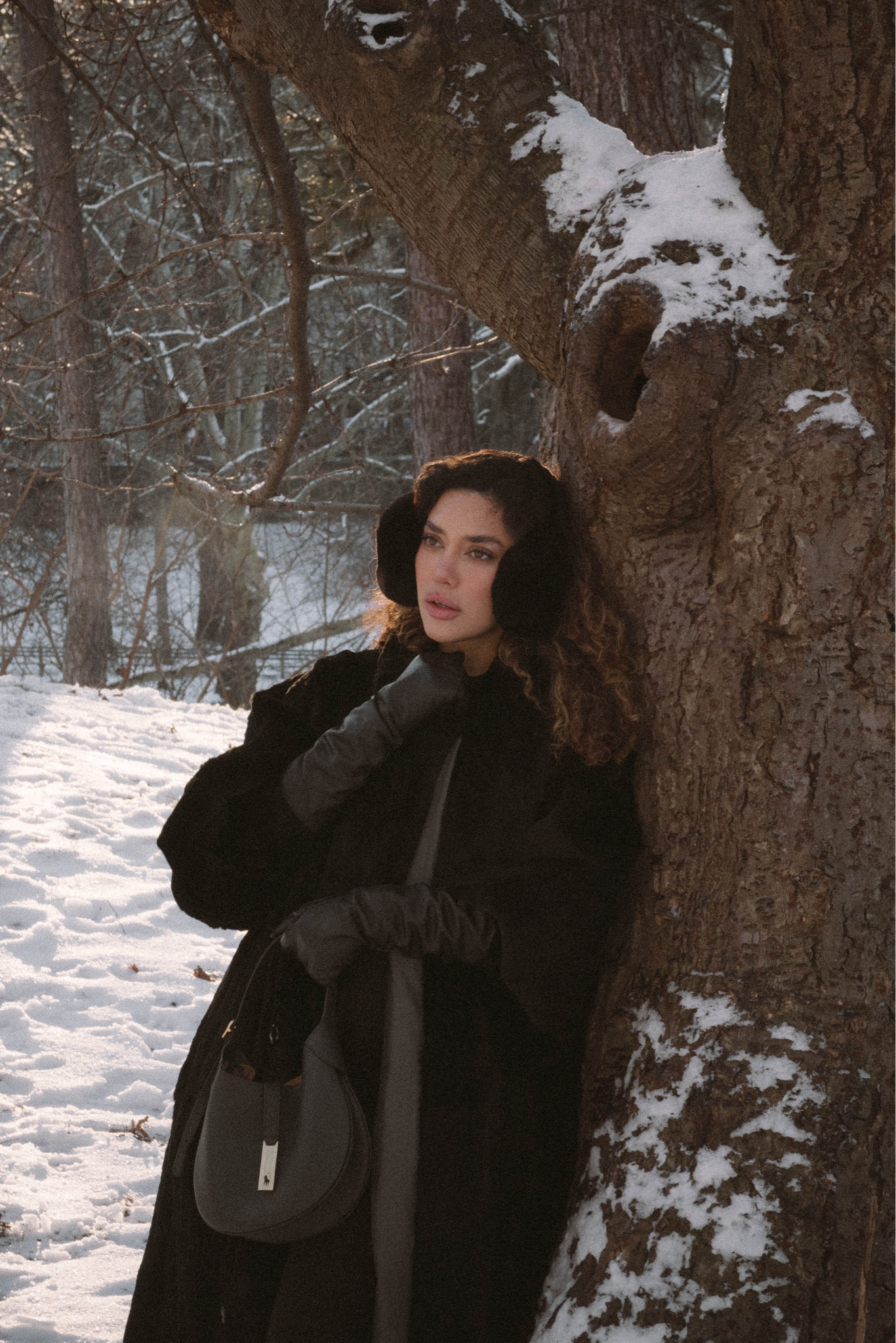 Elegant Winter Blacks 🖤 I’m wearing a vintage fur coat and earmuffs and leather gloves