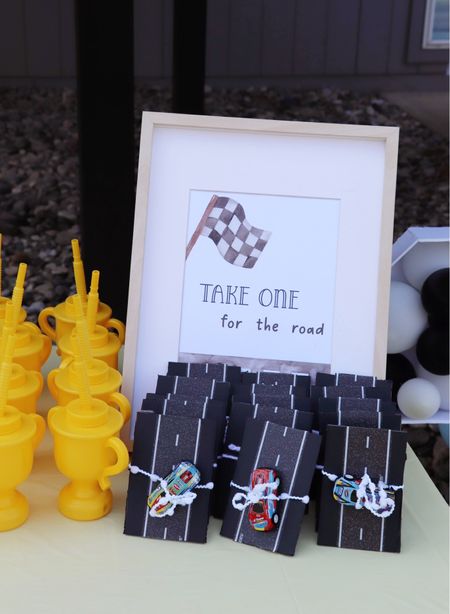 This race car themed bday party was so fun! The favors for the kiddos were little race cars and they got to keep their trophy cups! #birthdayparty #kiddoparty 

#LTKfamily #LTKparties #LTKkids