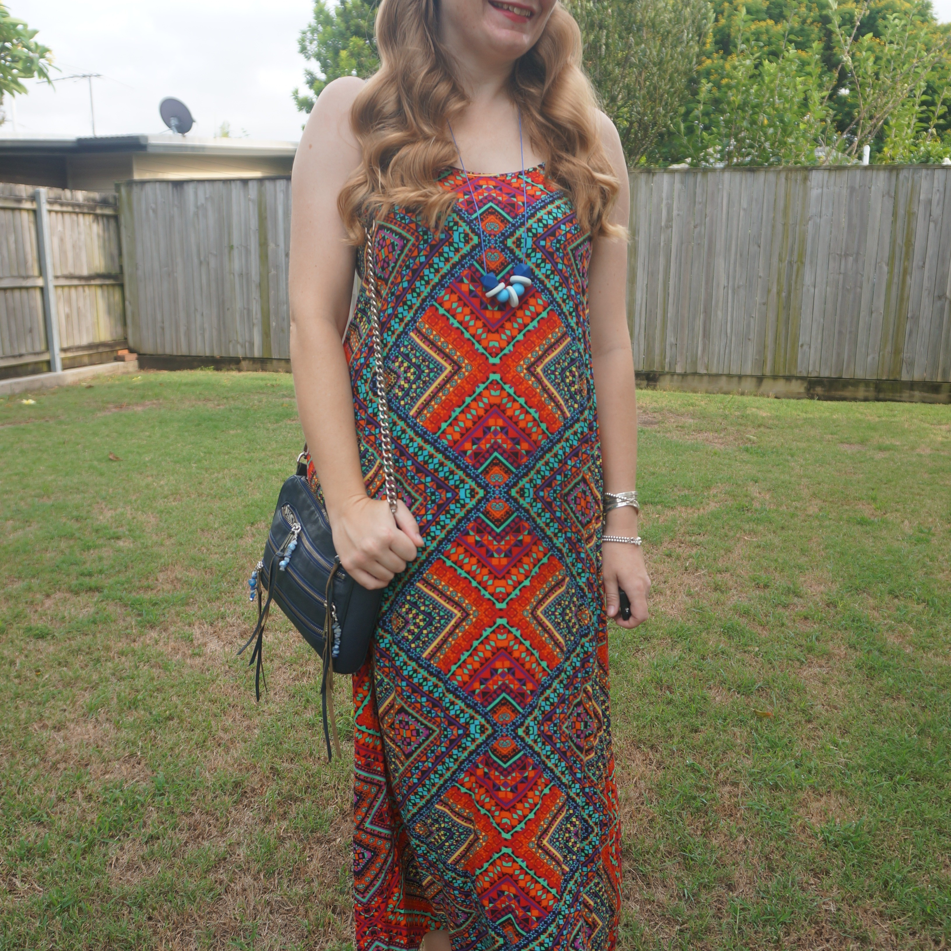 Thrifted geometric print maxi dress with navy Rebecca Minkoff mini 5-zip bag again 💙

#LTKbag #LTKsummer #LTKaustralia