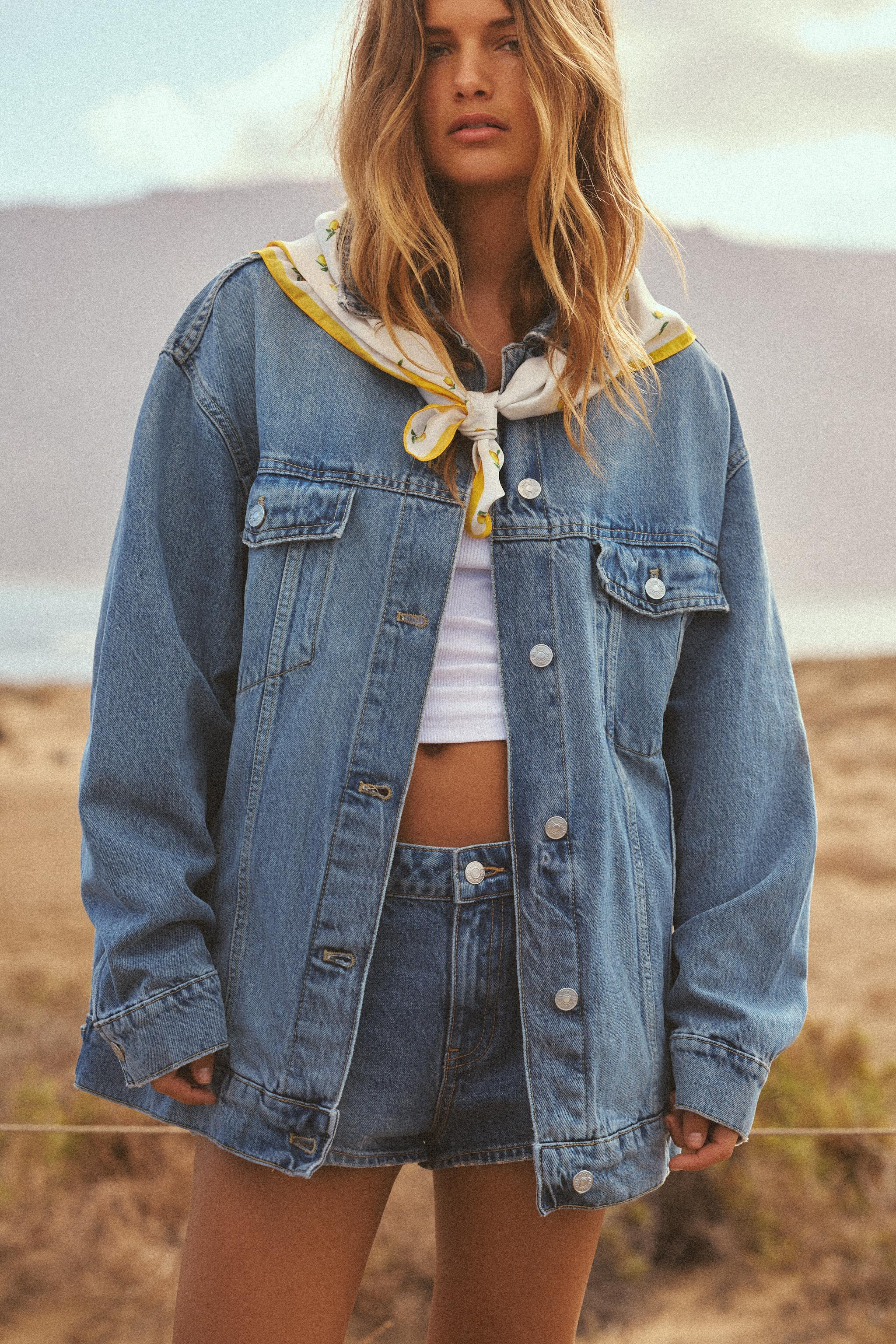 Oversized lapel collar jacket. Long sleeves with dropped shoulders and cuffs. Patch pockets on th... | Zara US