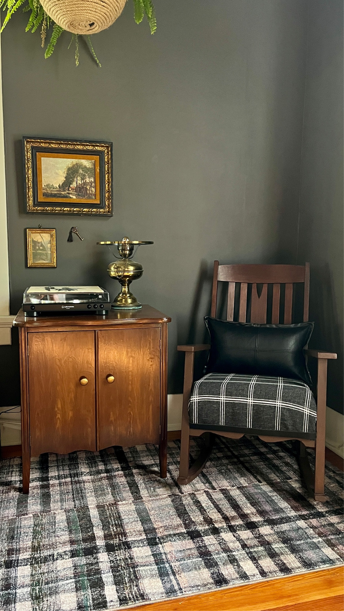 I love mixing new and vintage! I reupholstered this old rocking chair with plaid wool, paired with a faux leather pillow and a plaid rug 🖤

#LTKunder100 #LTKhome #LTKFind