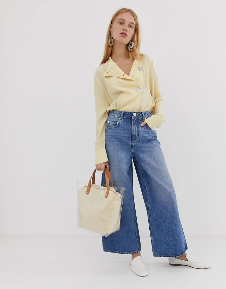 ASOS DESIGN premium wide leg jeans in mid wash blue | ASOS (Global)