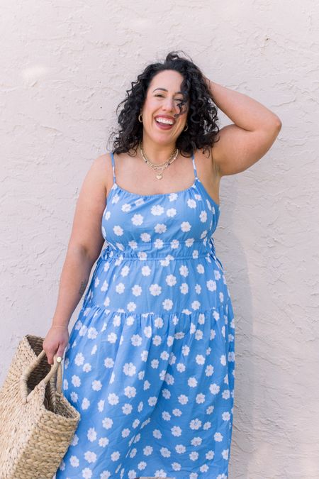 How fun is this midsize floral dress from Target?! Perfect for a fun spring look, graduation dress, or beach vacation dress! 

#LTKmidsize #LTKstyletip #LTKtravel